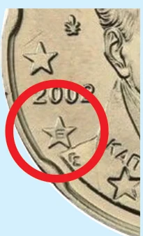9 号位置星内字母“E”